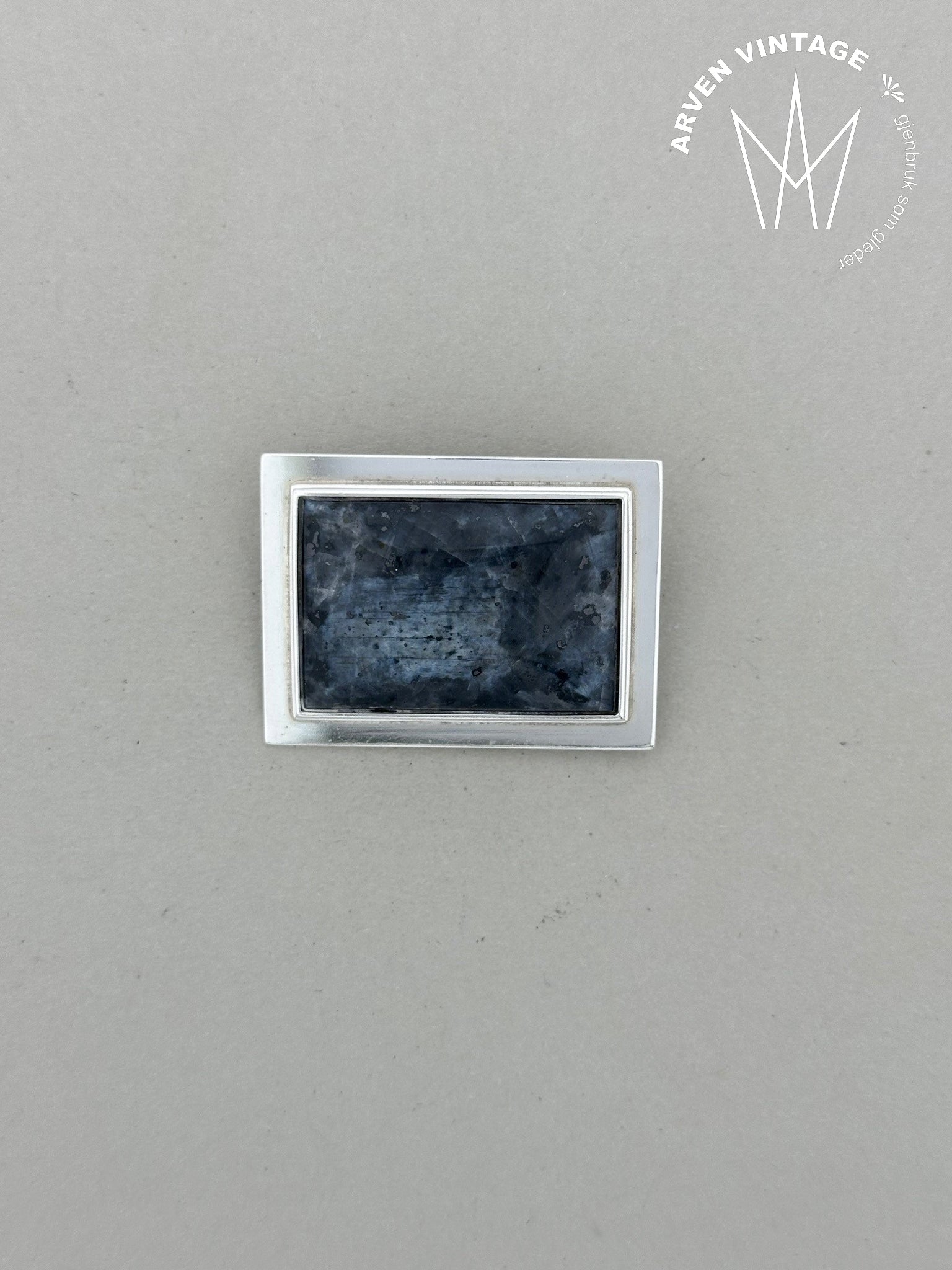 Vintage silver brooch with gray stone