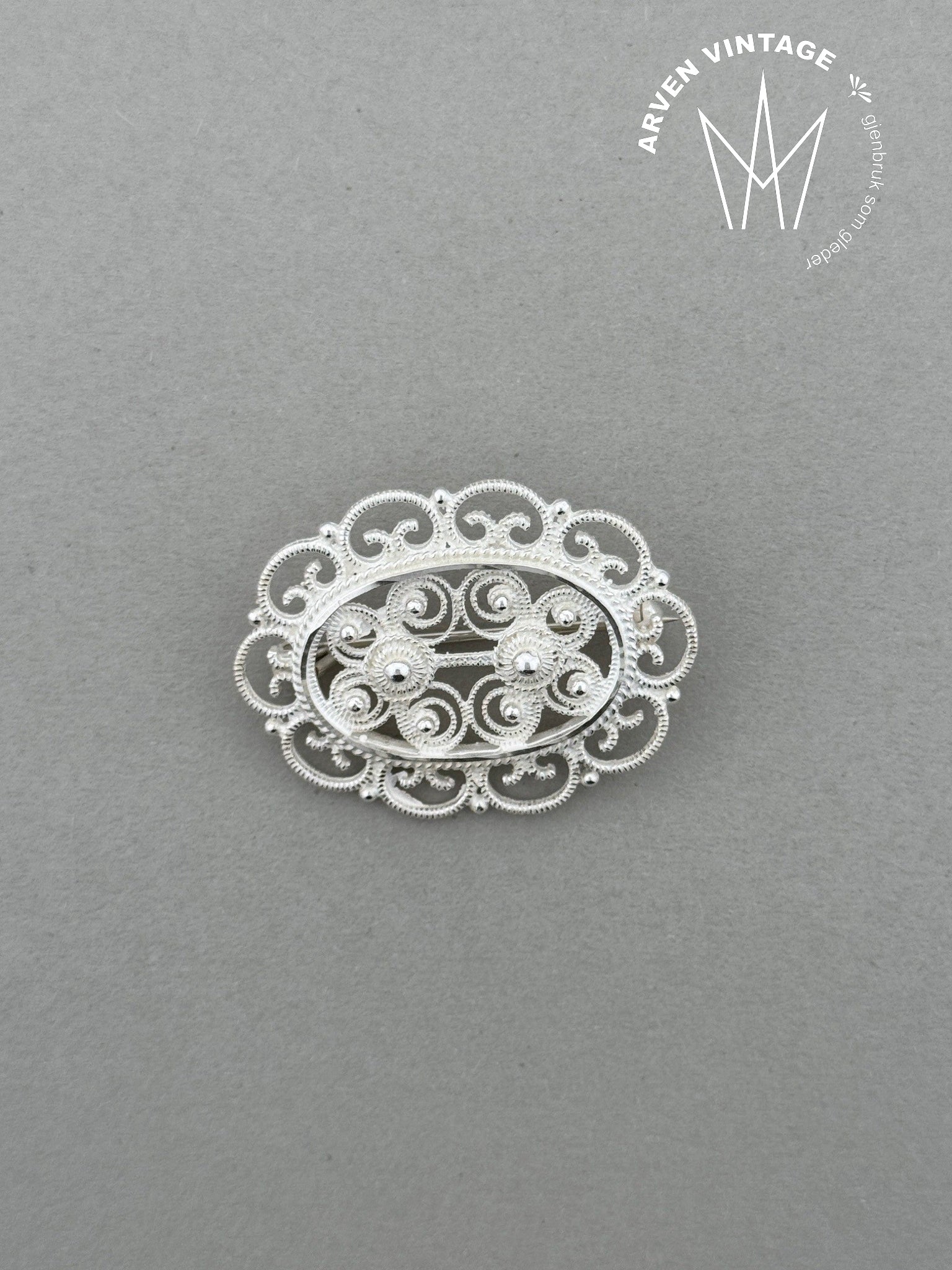 Vintage silver filigree brooch