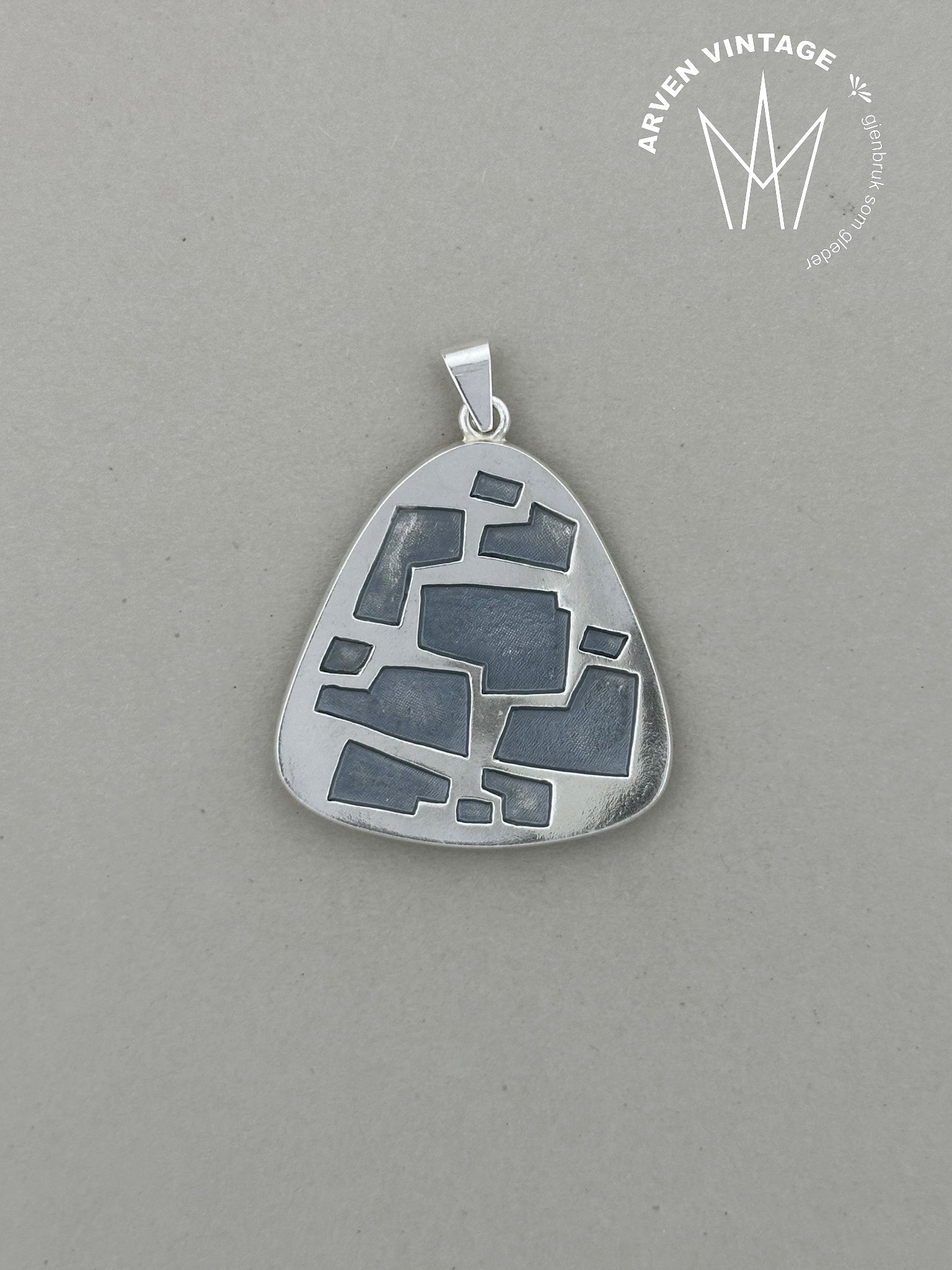 Vintage oxidized silver DA pendant