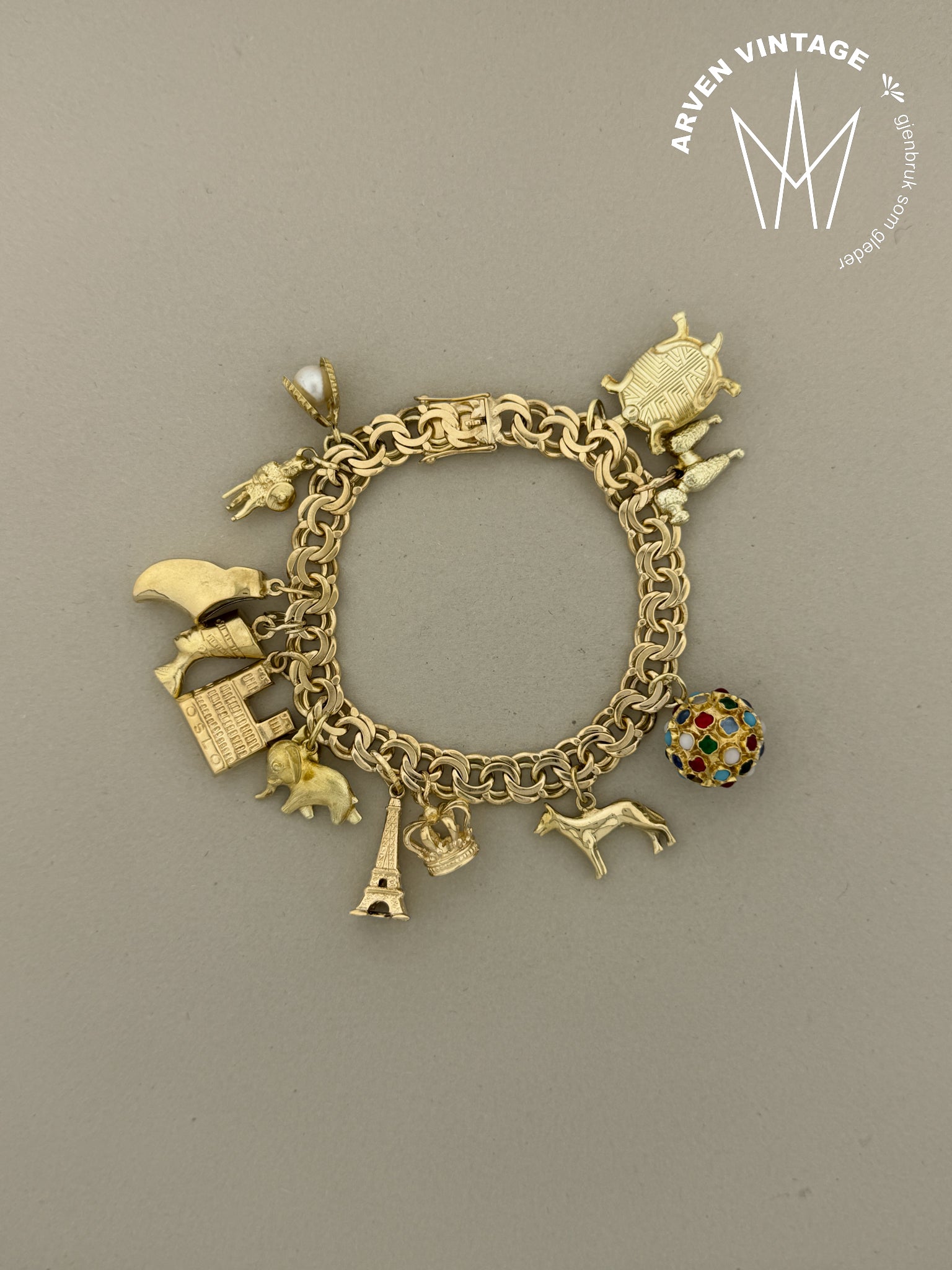 Vintage charmsarmbånd gult gull 18cm