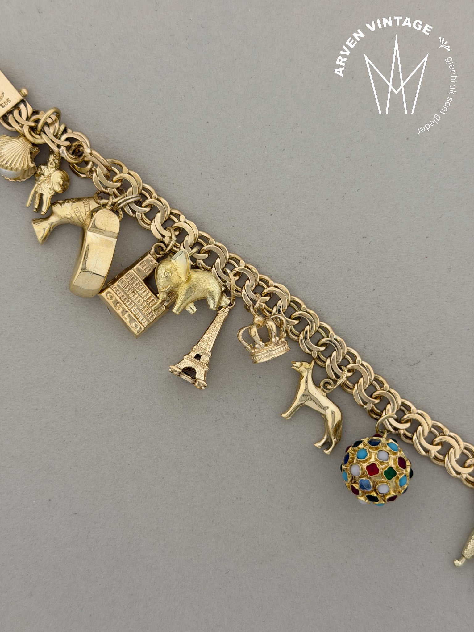 Vintage charmsarmbånd gult gull 18cm