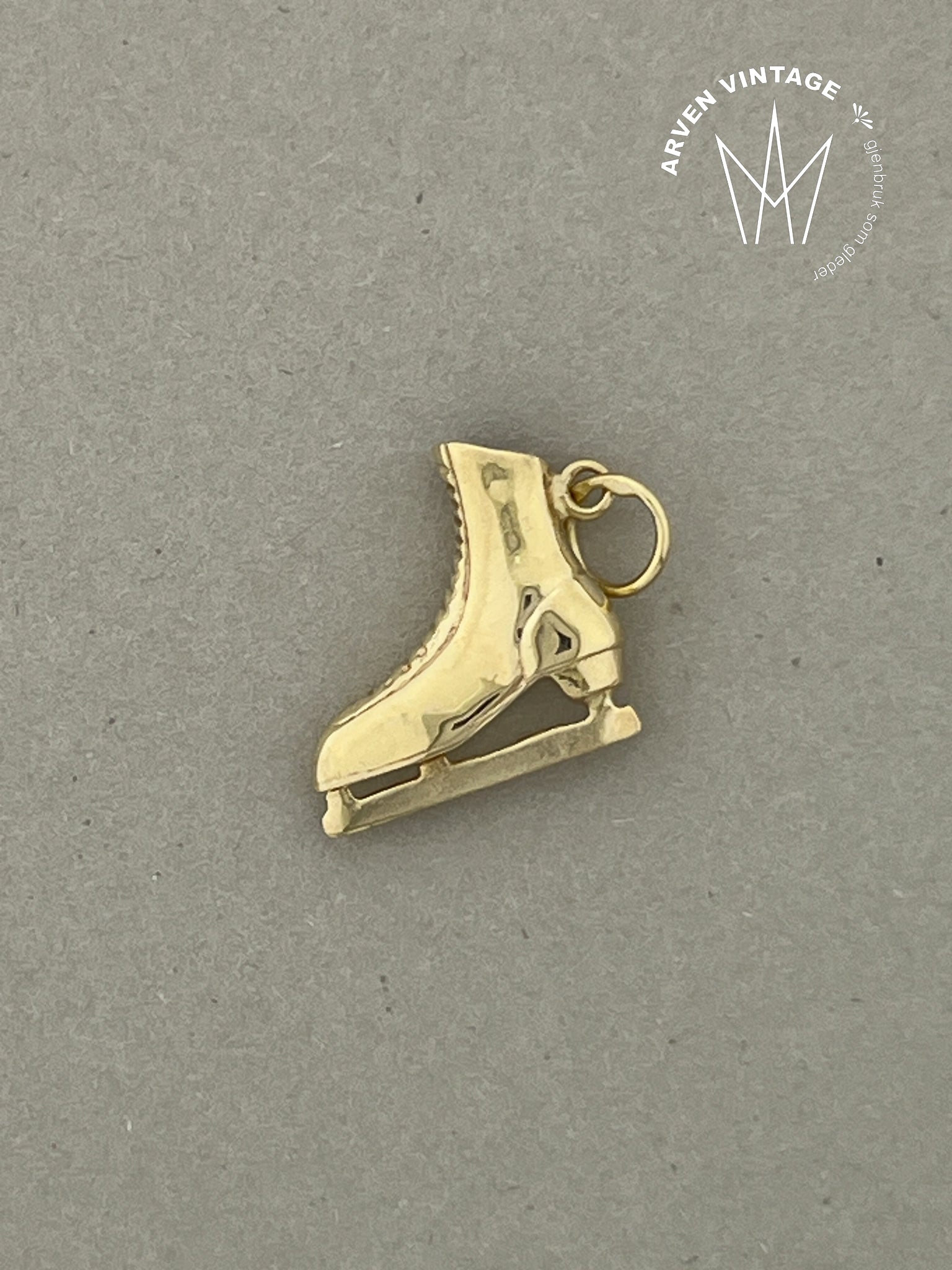 Vintage skøyte-anheng gult gull