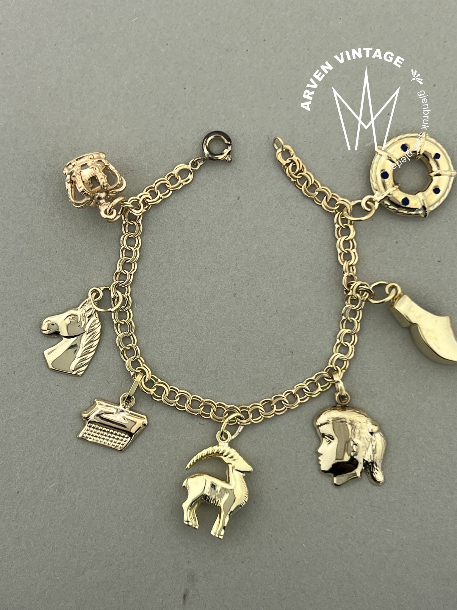Vintage charmsarmbånd gult gull 15cm