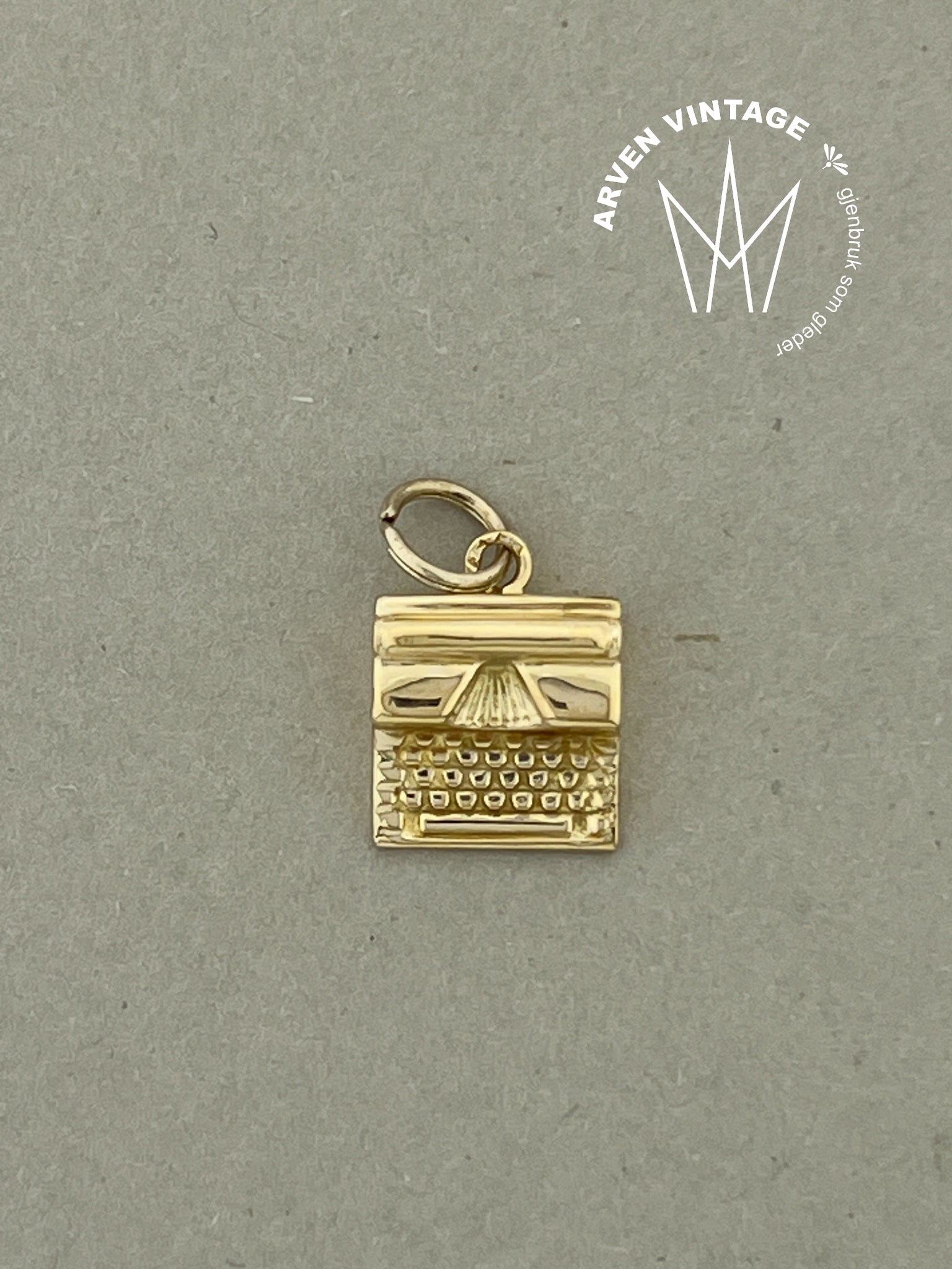 Vintage skrivemaskin-anheng gult gull