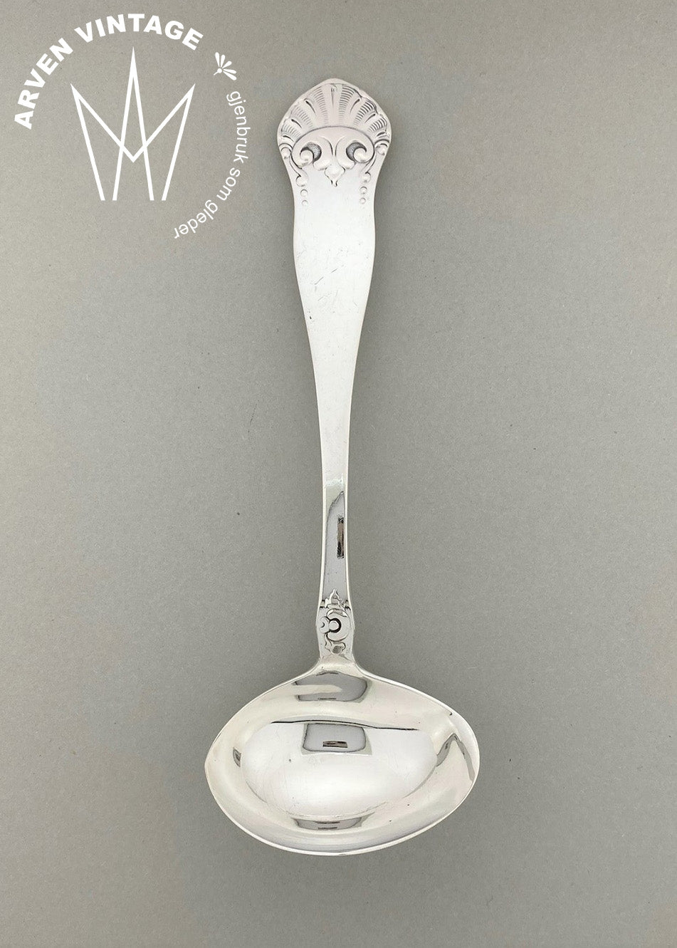 Vintage Crown style cream spoon