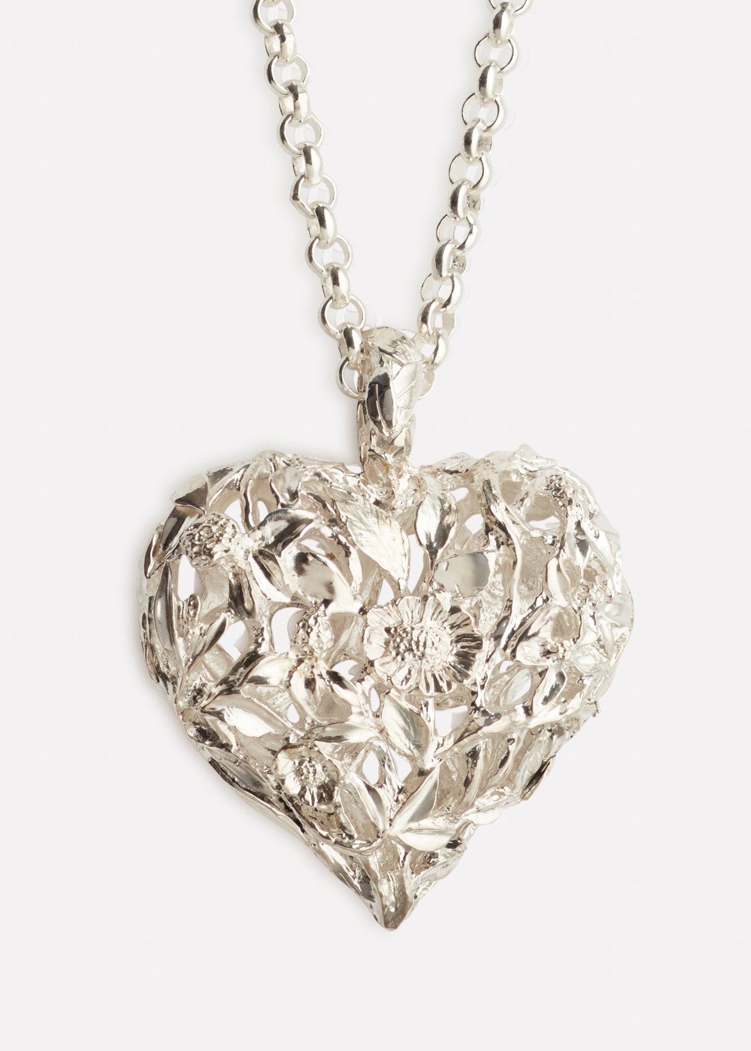 Red clover heart necklace in silver
