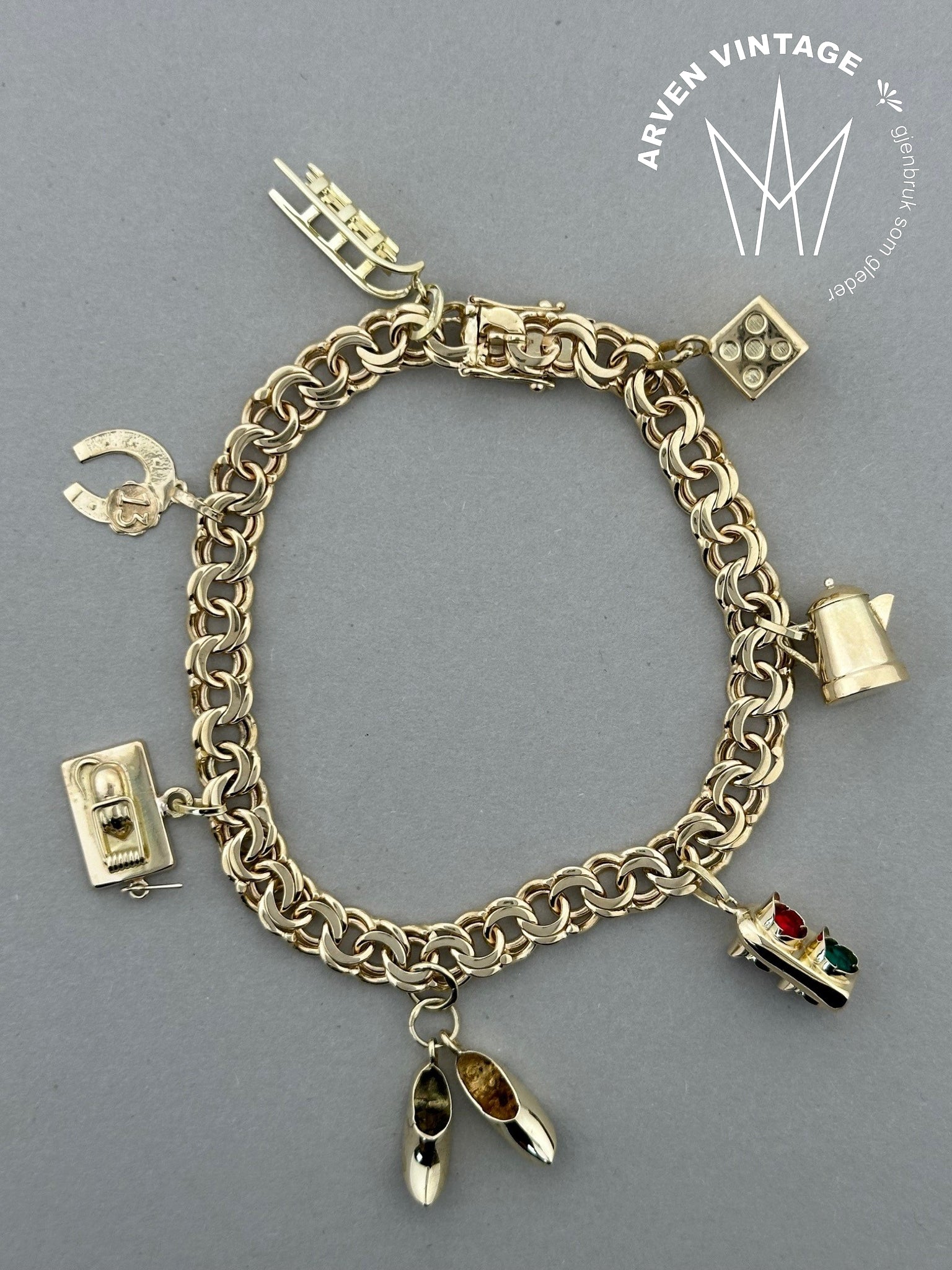 Vintage Bismarck charm bracelet yellow gold 19cm