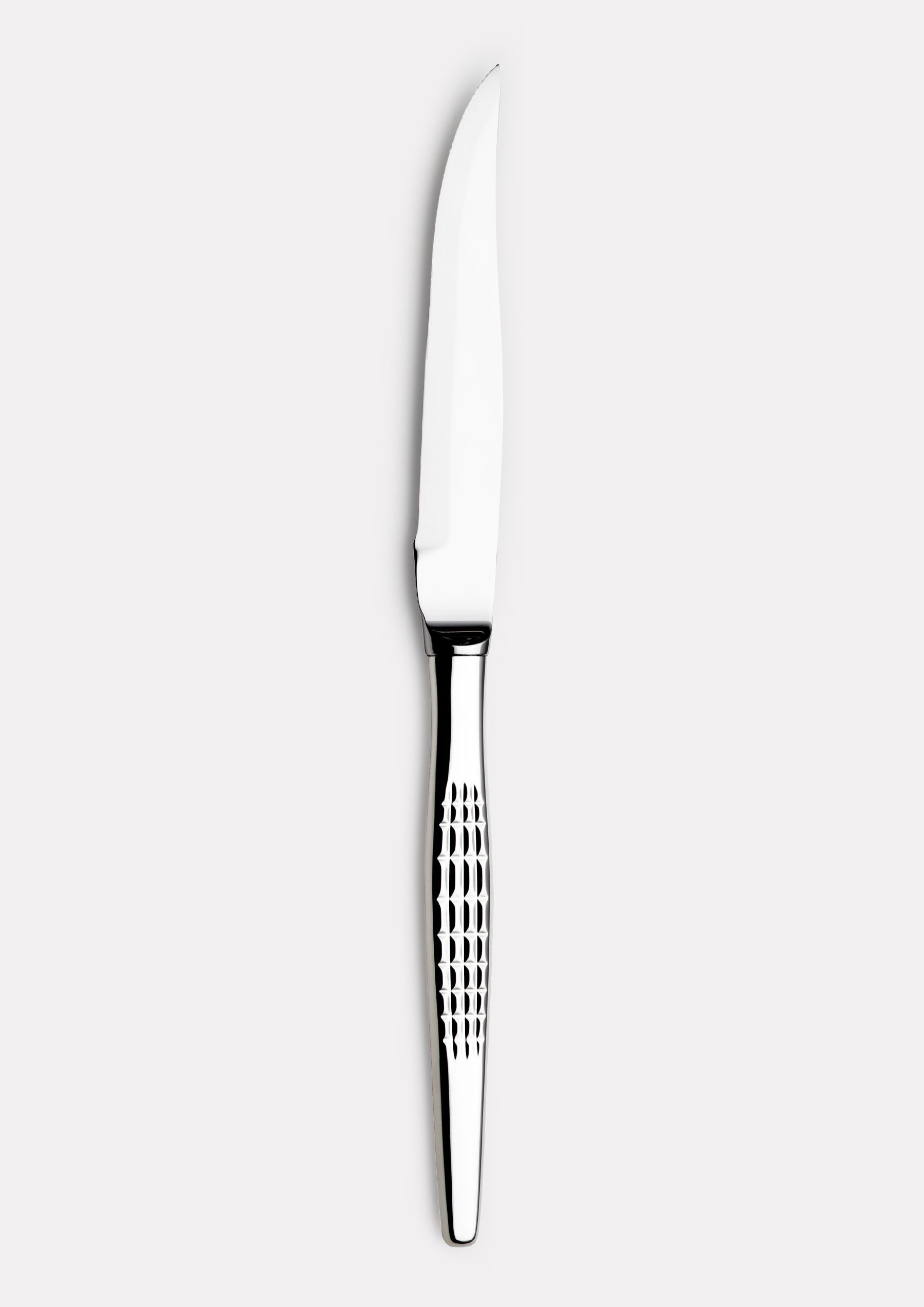 Faceted steak knife