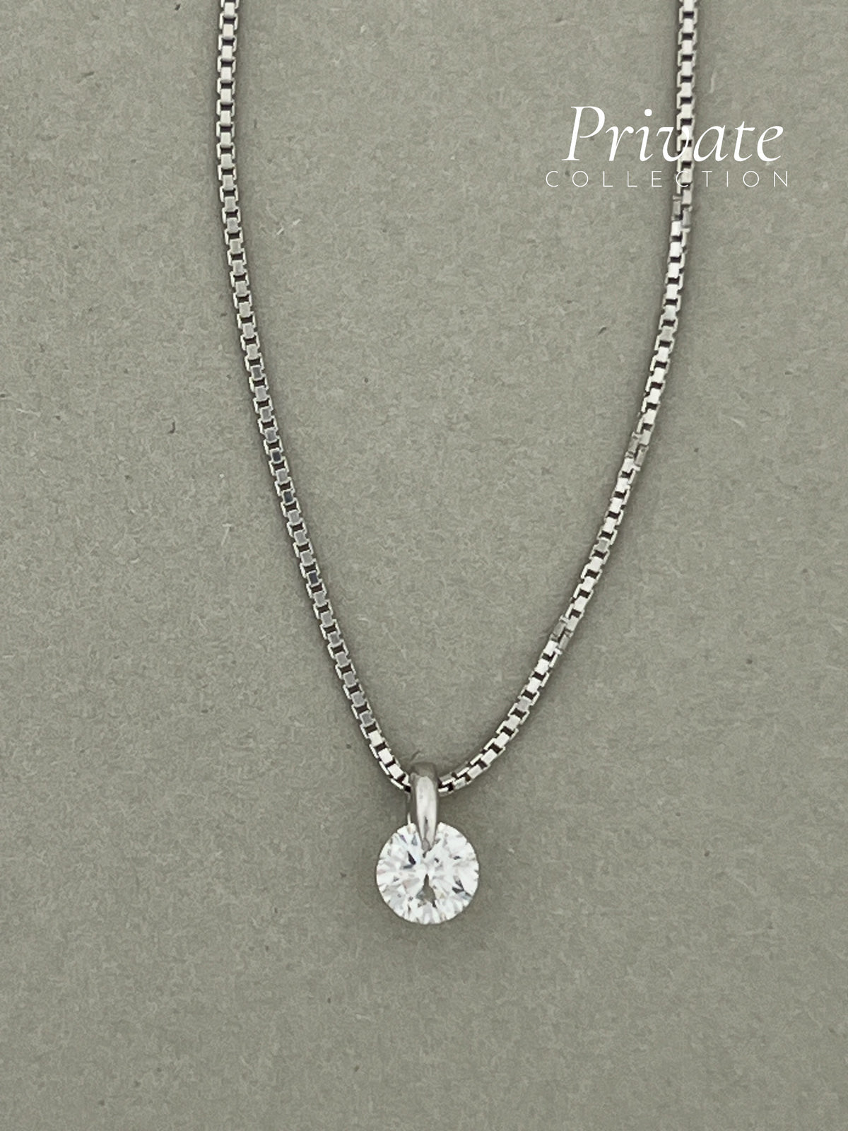 PC 18K white gold solitaire diamond pendant with chain