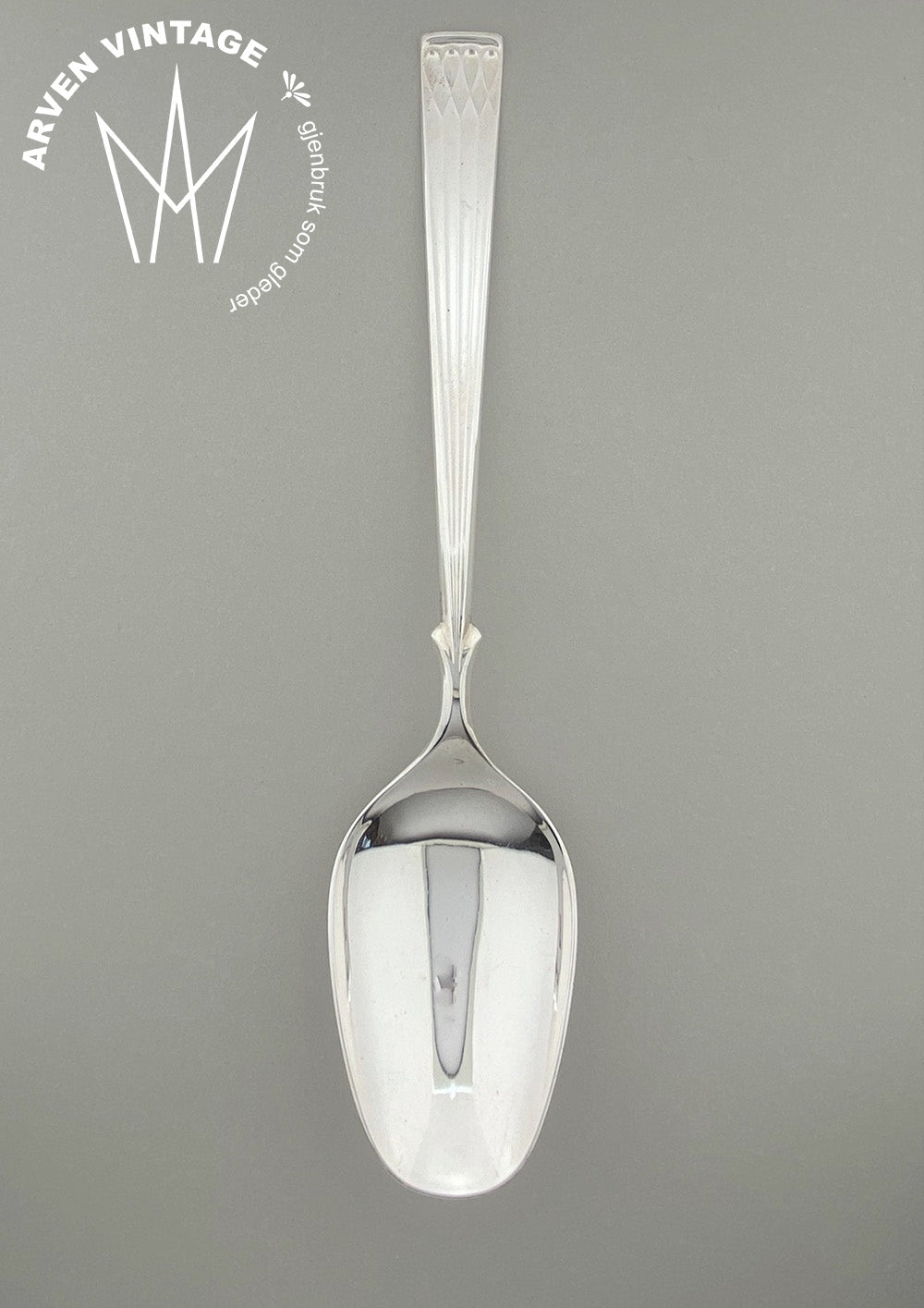 Vintage Heirloom silver serving spoon