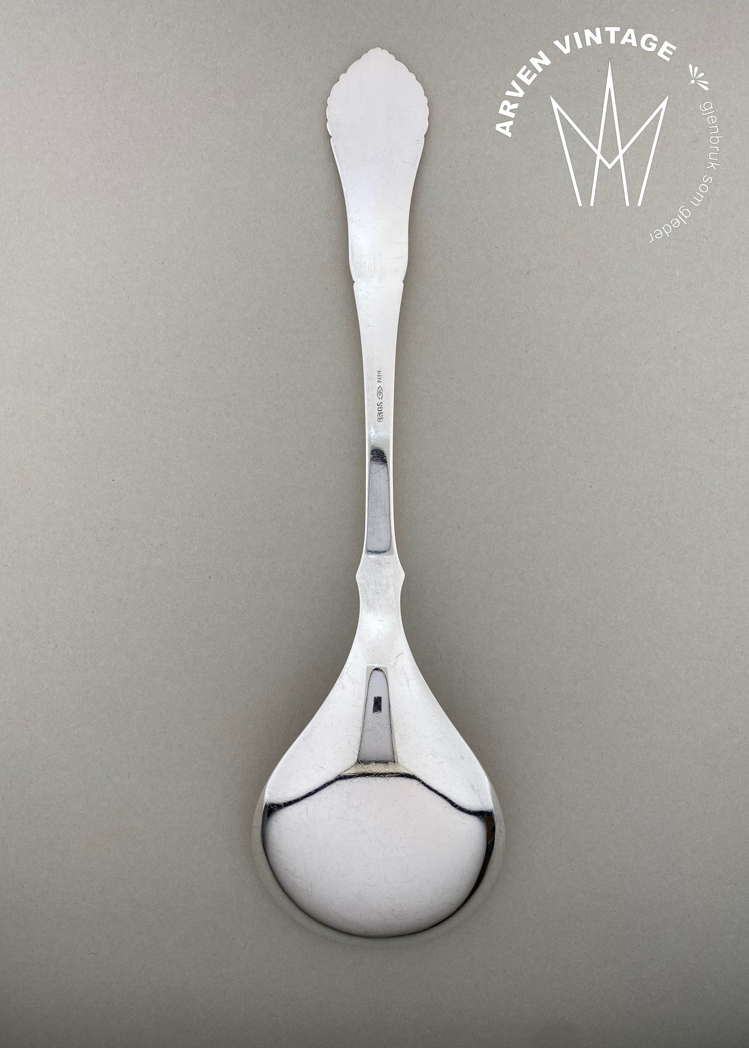 Vintage Menguerit serving spoon