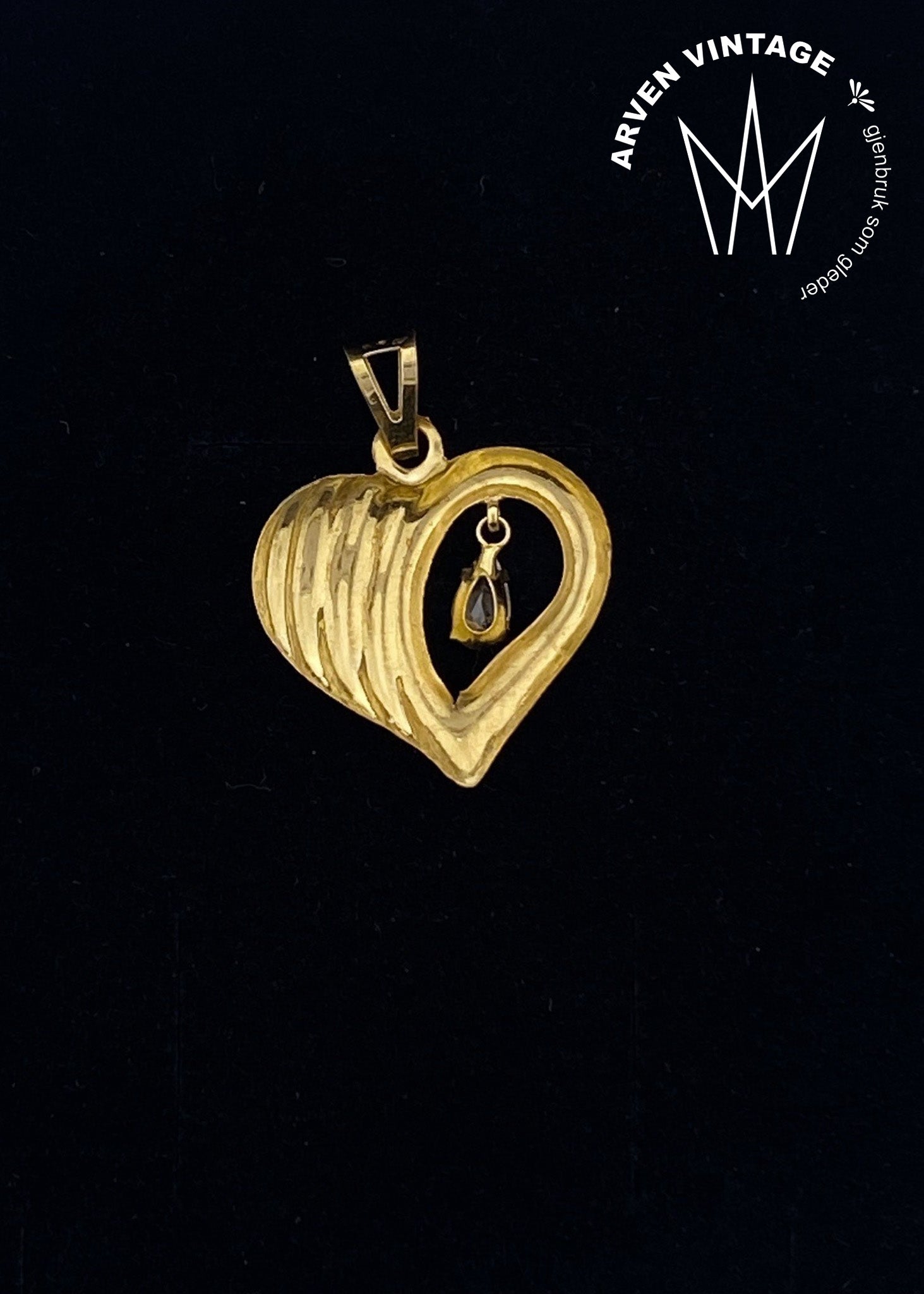 Vintage hjerteanheng i gult gull med blank sten
