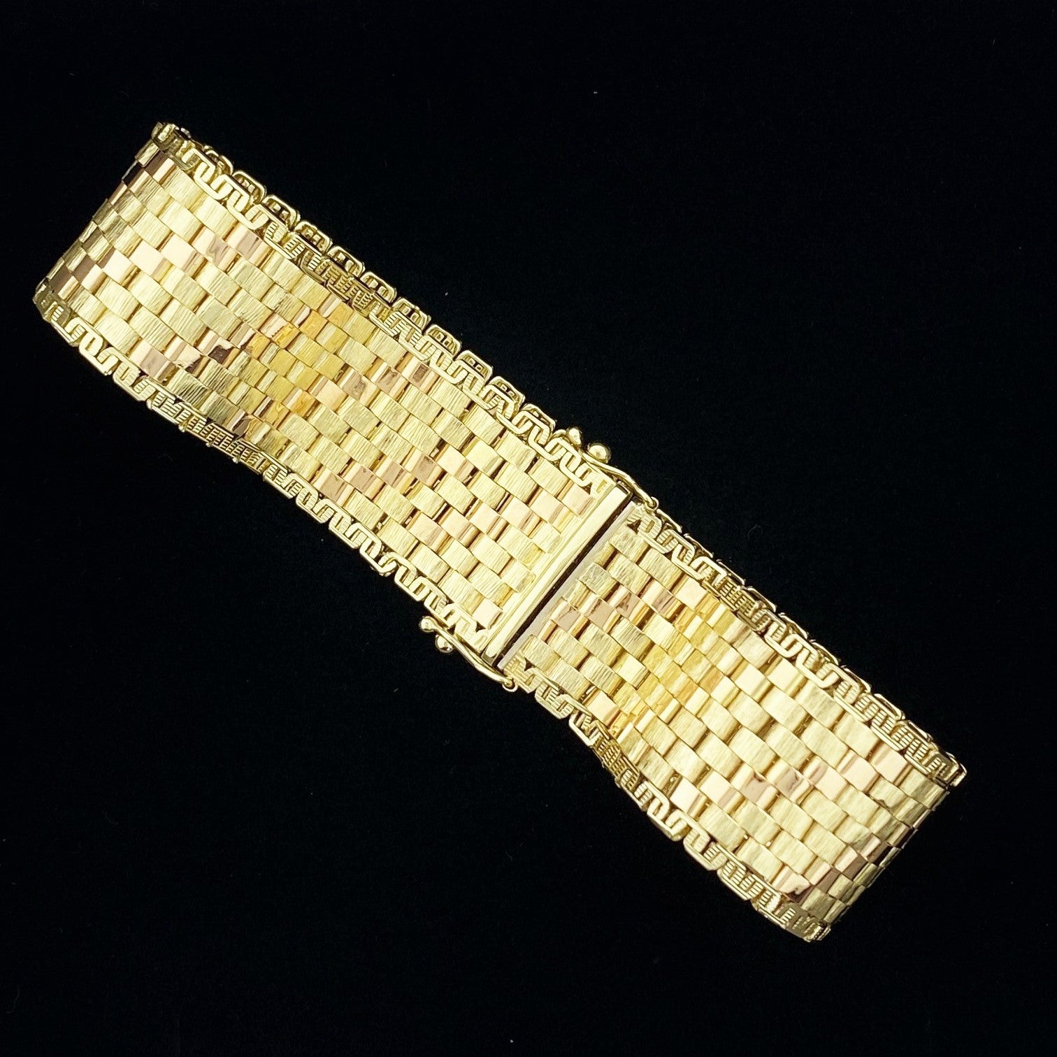 Vintage gold bracelet with textured surface