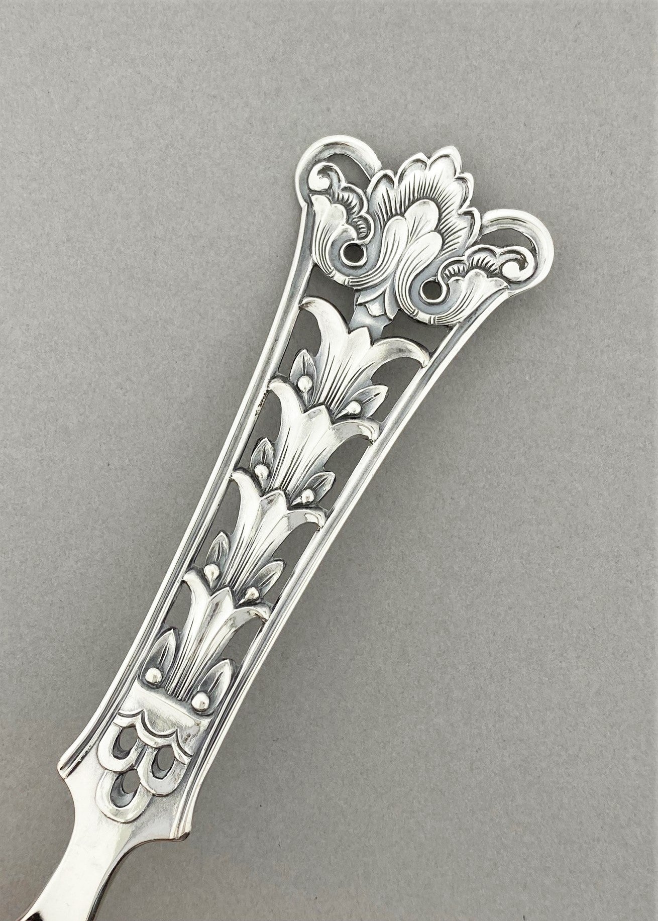 Vintage cream spoon in unknown pattern